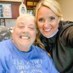 Services2_03-min Dentist smiling with patient