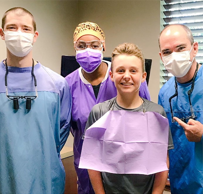 Services2_10-min dental staff with young patient