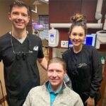 Services2_14-min dentist and assistant with a patient