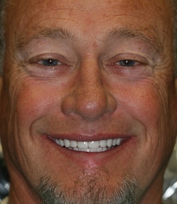 MILAM|JACK|A man smiling
